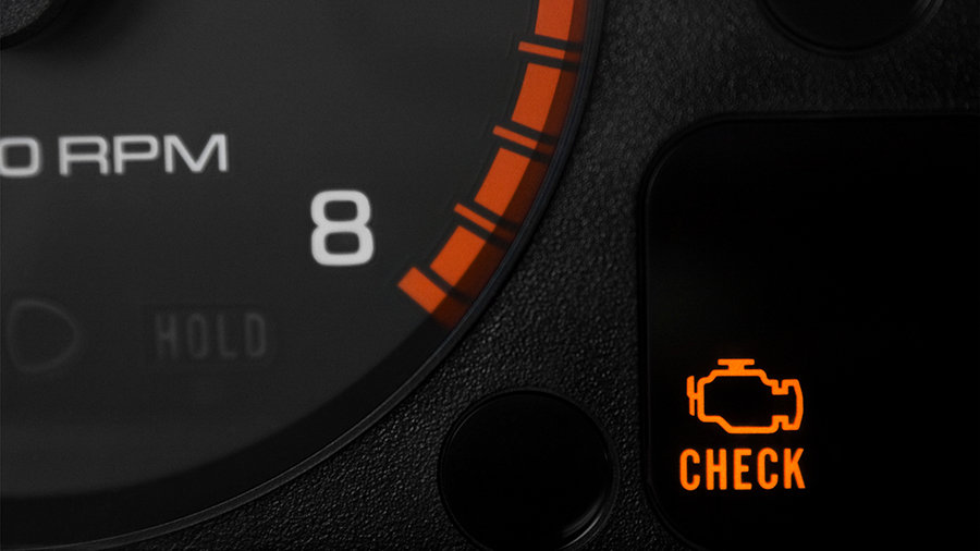 Check engine light warning on dashboard